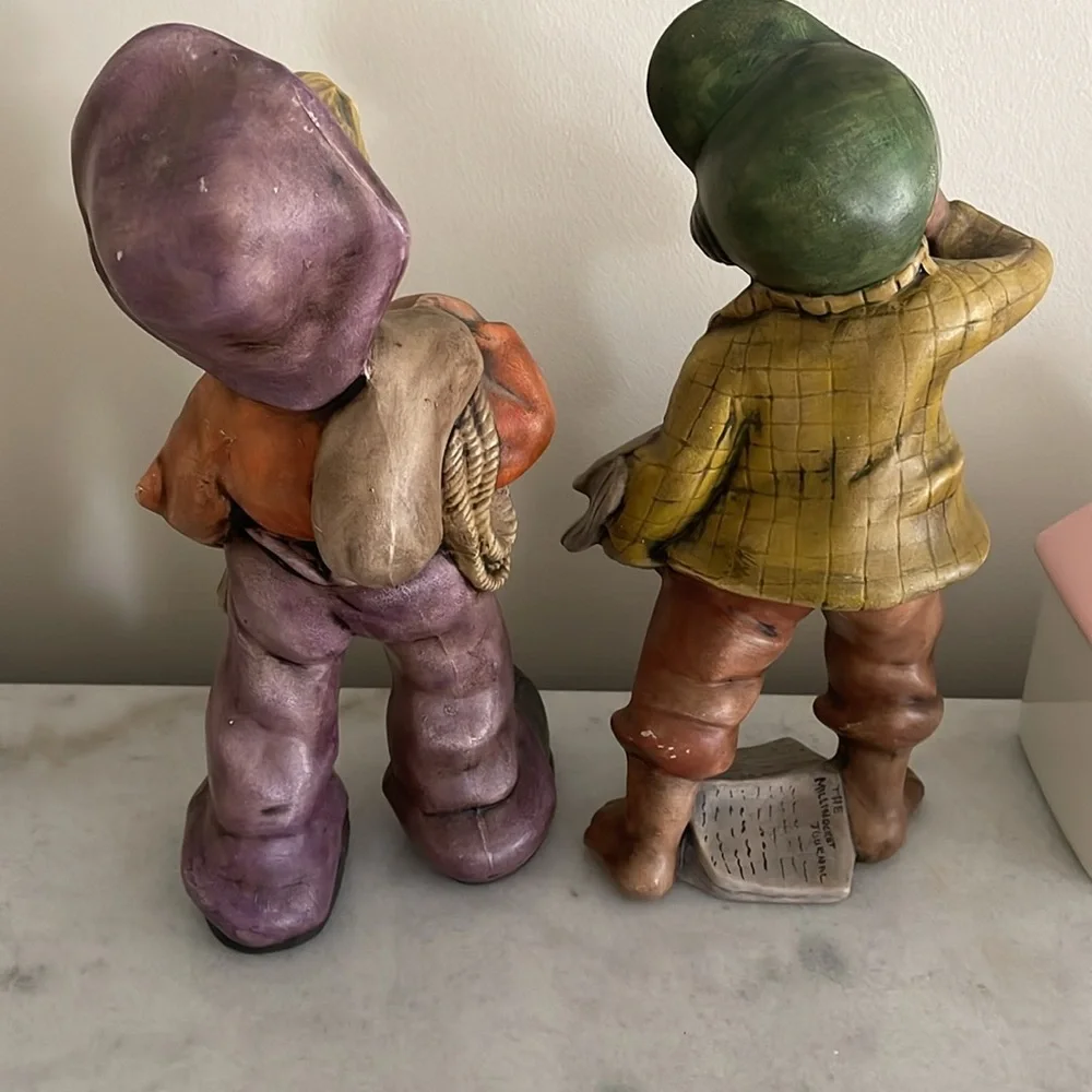 Paperboy and hobo ceramic figurines